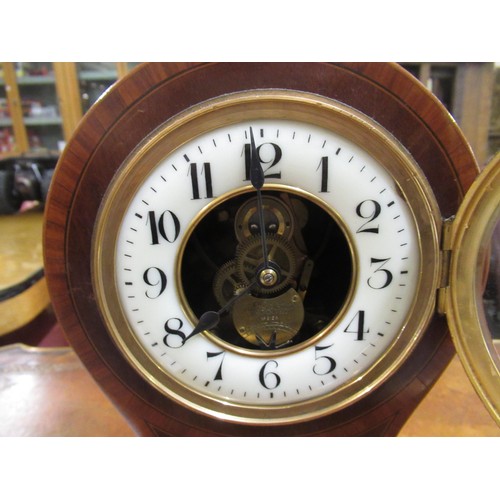 1118 - Large mahogany shell inlaid Eureka electric clock, the circular dial with Arabic numerals, inscribed... 