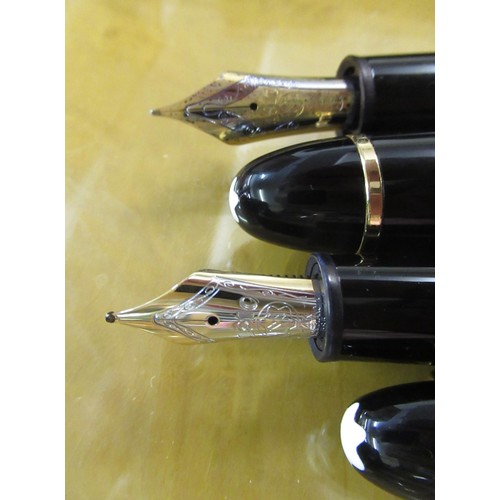 94A - Montblanc No. 149, two fountain pen set, one with an 18ct gold nib, the other with a 14ct gold nib