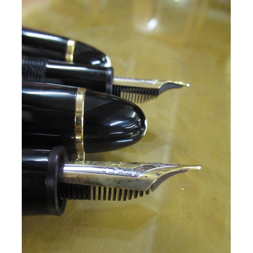 94A - Montblanc No. 149, two fountain pen set, one with an 18ct gold nib, the other with a 14ct gold nib