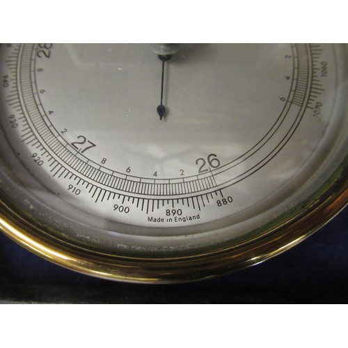 1108 - Negretti & Zambra, circular gilt brass cased aneroid barometer inscribed ' Mark I ', together with a... 