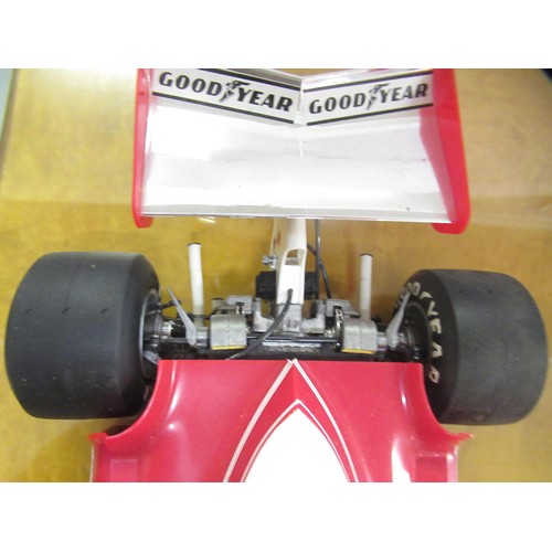 127 - Two mint boxed 1/18th scale die cast metal model racing cars of Lotus 49B by A Model and UT models o... 