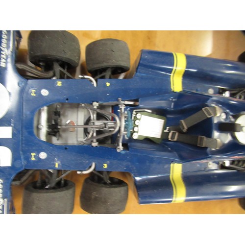 127 - Two mint boxed 1/18th scale die cast metal model racing cars of Lotus 49B by A Model and UT models o... 