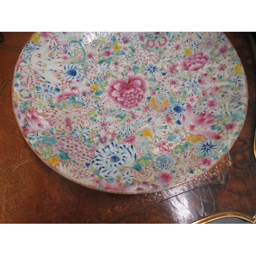 427 - Chinese famille rose shallow dish, all-over floral decorated, 33cm diameter