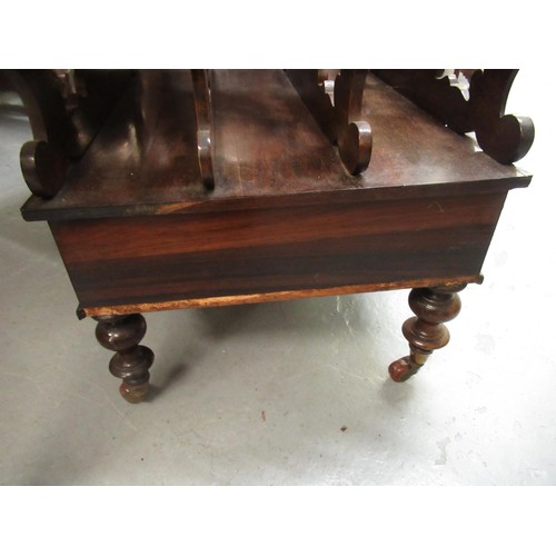 1446 - Victorian rosewood three division Canterbury, with pierced sides above a single drawer