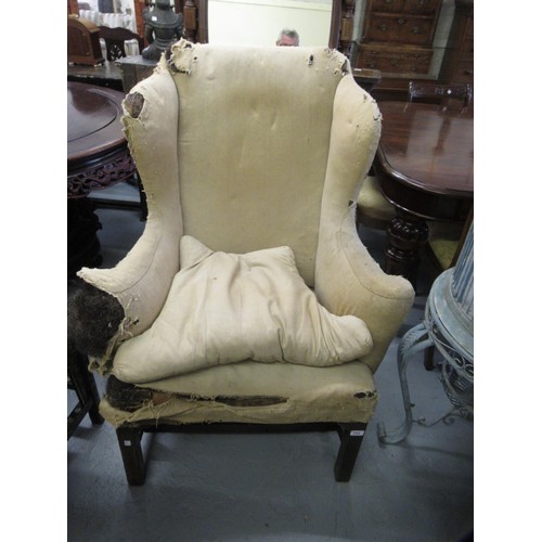 1504 - George III wingback armchair, with loose cushion, scroll arms and square chamfered front supports wi... 