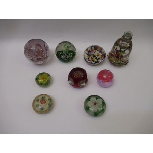 382 - Box containing a collection of nine various glass paperweights, including Caithness and Millefiori