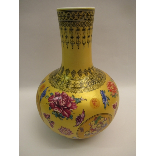 Modern Chinese porcelain baluster form vase, printed with figures and flowers on gold ground, 30cm high