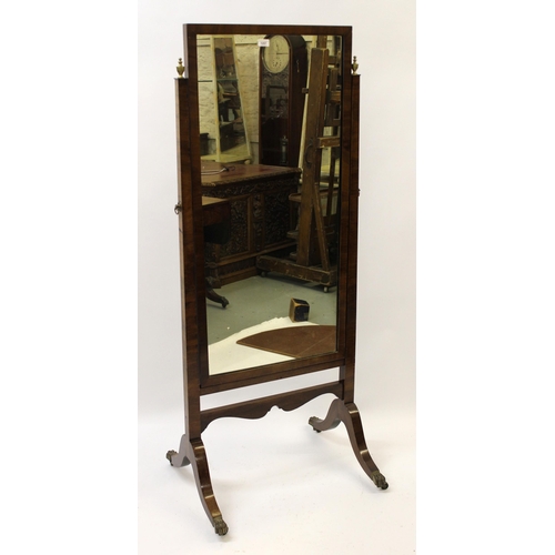 19th Century mahogany rectangular swing frame cheval mirror, on sabre supports with brass caps and casters, 164 x 69cm approximately