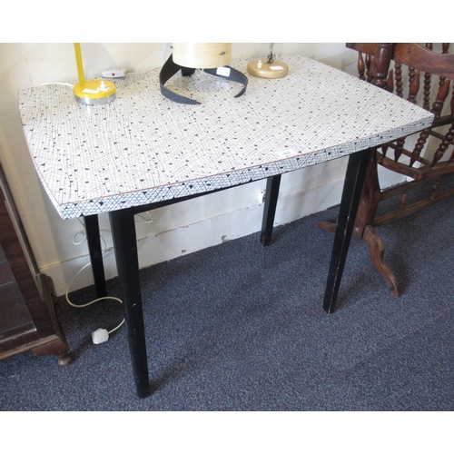 1484 - Mid 20th Century Italian Formica top kitchen table, raised on ebonised supports, 93 x 60 x 77cm high