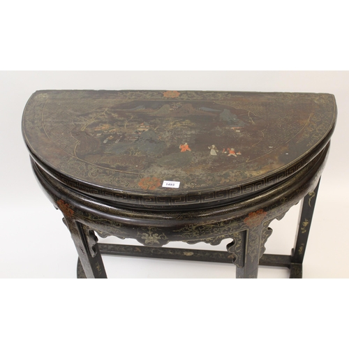 1493 - 19th Century Chinese black chinoiserie decorated D-shaped side table, the top decorated with a lands... 