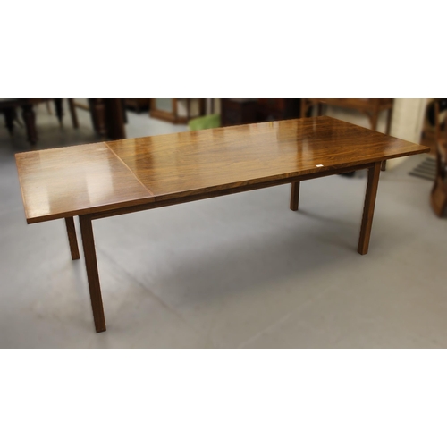 1498 - Gordon Russell Limited, walnut rectangular dining table with integral single leaf on square supports... 