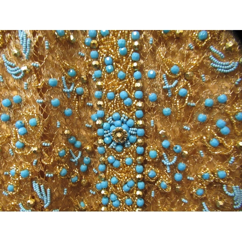 104 - Ladies 1950's yellow silk and beadwork dress, together with another heavy gold thread work and turqu... 