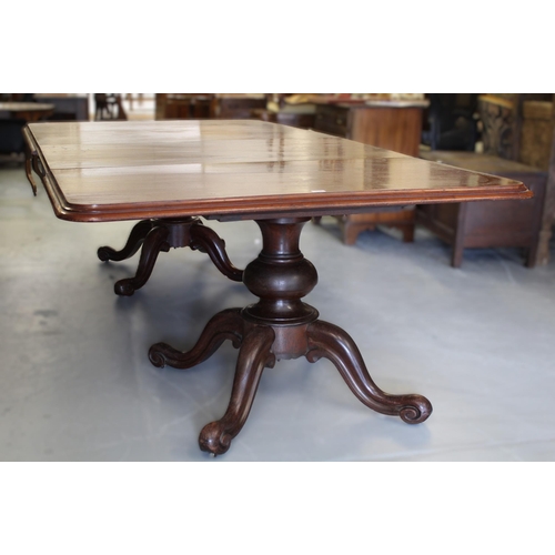 Victorian mahogany twin pedestal dining table on turned column and quadruped scroll supports, 140cm deep x 308cm extended (with another small leaf utilised to form a single pedestal table)