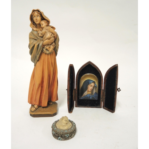 173 - Porcelain plaque of the Madonna in folding case with easel, an Italian carved wooden figure of the M... 