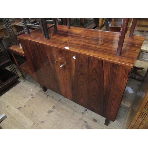 1959 - Mid 20th Century exotic hardwood veneered two door drinks cabinet, with chiller compartment, the doo... 