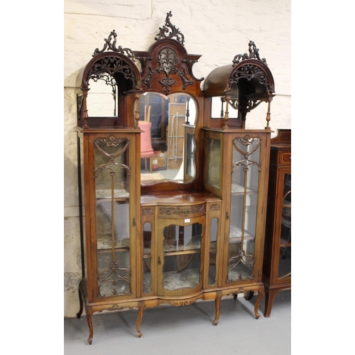 1962 - Large late 19th / early 20th Century mahogany display cabinet of ornate architectural form, the pier... 