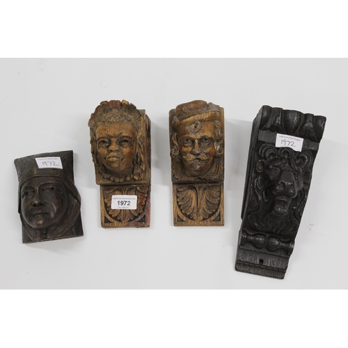 1972 - Pair of small 19th Century carved oak mask head wall appliques, 16cm high, together with two others ... 