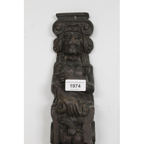 1974 - Pair of 17th Century carved oak caryatids of male and female figures above mask heads and fruit, 50c... 