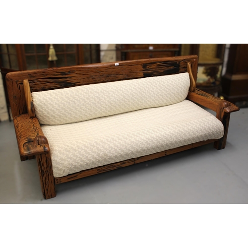 1975 - Modern low exotic hardwood sofa (possibly reclaimed railway sleepers), the back and seat cushions a ... 