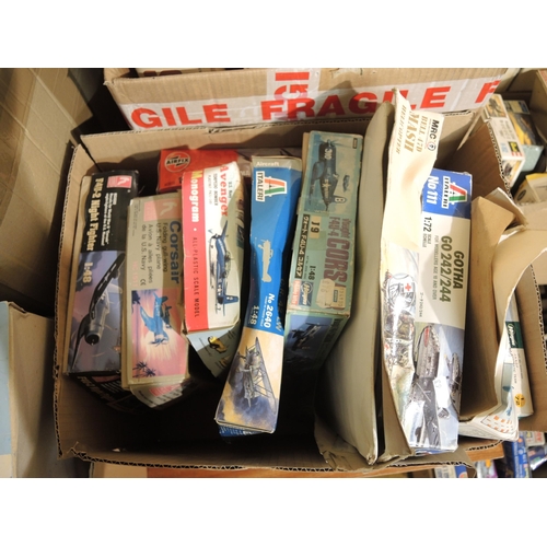 203 - Five boxes containing a large quantity of unbuilt model aircraft kits including Frog, Airfix, Revell... 