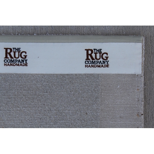 23 - The Rug Company, ' Holland Stone ' silk bordered rug, 363 x 210cm