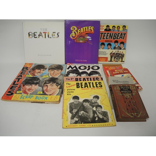 242 - Beatles scrapbook, together with a quantity of other Beatles related magazines and volumes, and a sm... 