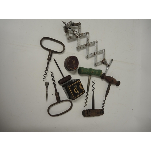 258 - Box containing a small quantity of various corkscrews and two leather covered inkwells, one stamped ... 