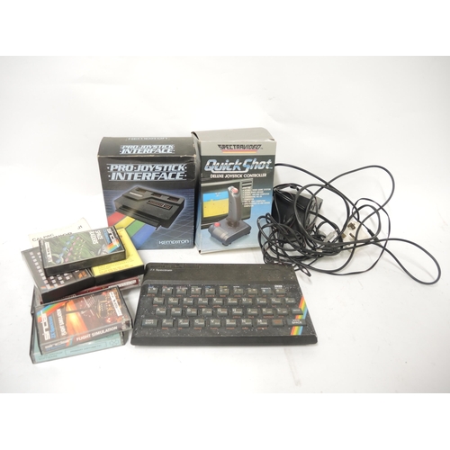 263 - Sinclair ZX Spectrum computer with accessories and games