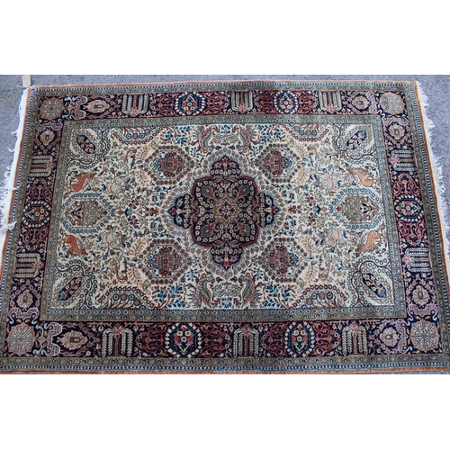 27 - Small Qum silk rug with central medallion floral and animal design with borders, 111 x 160cm, (fring... 