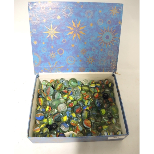 291 - Small blue box containing a collection of various 20th Century marbles