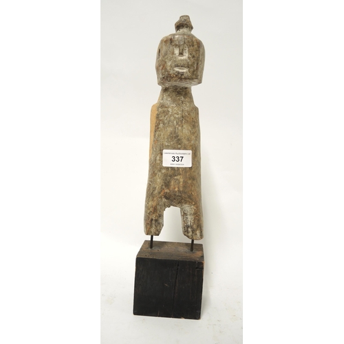 337 - West African carved wooden standing figure on a later base, 39cm high