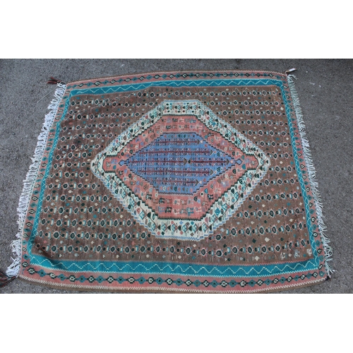 4 - Small Kelim rug with single medallion design in shades of pale blue and rose pink, 142 x 130cm appro... 