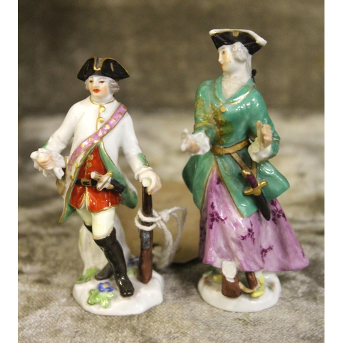 496 - Two miniature Meissen figurines of riflemen, (both at fault)