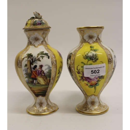 502 - Pair of Dresden porcelain baluster form vases with one cover, decorated with panels of figures and f... 