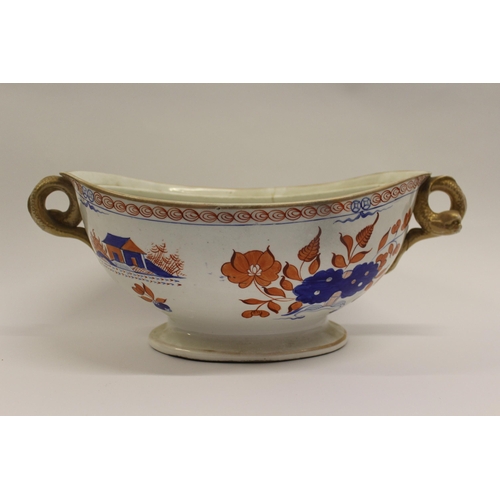 519 - Lowestoft type two handled tureen decorated in iron red and blue (at fault)