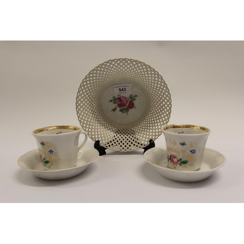 543 - KPM Berlin porcelain dish with pierced border, together with a pair of Berlin cups and saucers