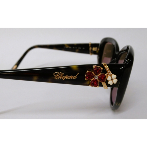 84 - Pair of ladies Chopard sunglasses in original case, together with another Chopard glasses case