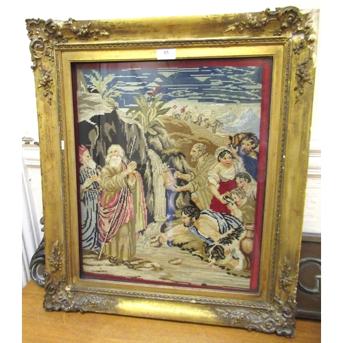 85 - 19th Century needlework picture, figures in a landscape, 50 x 42cm, gilt framed (damages to frame)