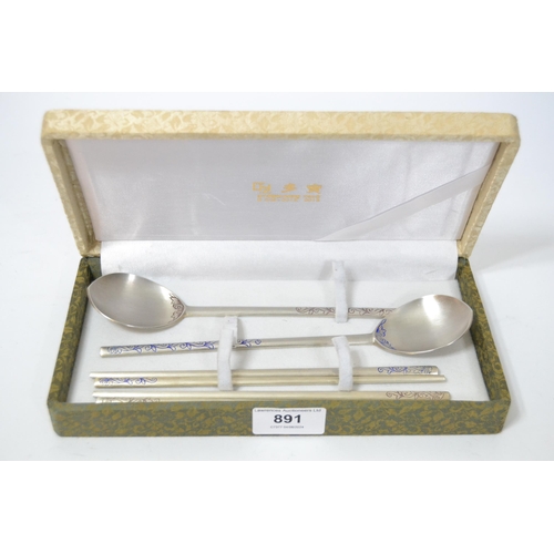 891 - Cased set of brushed silver decorated spoons and chopsticks, inscribed ' Gild AG 925 '