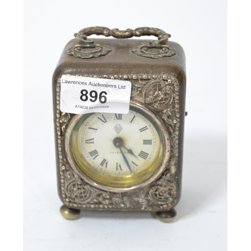 896 - Small early 20th Century silver mounted dressing table clock (at fault), 10cm high excluding loop ha... 