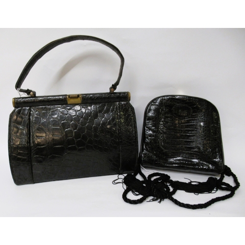 94 - Vintage black alligator leather handbag with brass catch, 24cm wide, together with a similar later b... 