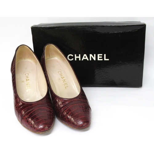 96 - Pair of ladies Chanel burgundy crocodile leather court shoes, marked size 7.5, with original box