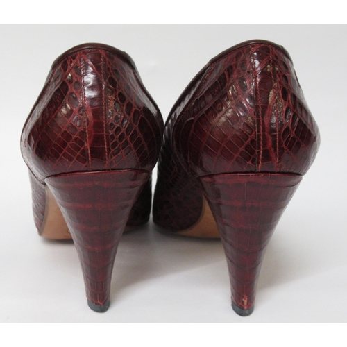 96 - Pair of ladies Chanel burgundy crocodile leather court shoes, marked size 7.5, with original box