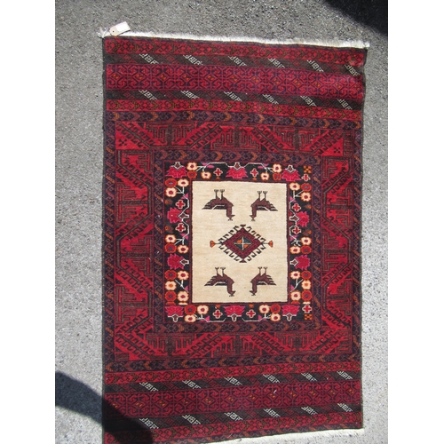 20B - Belouch rug with a medallion and bird design centre panel within multiple borders, 146 x 96cm