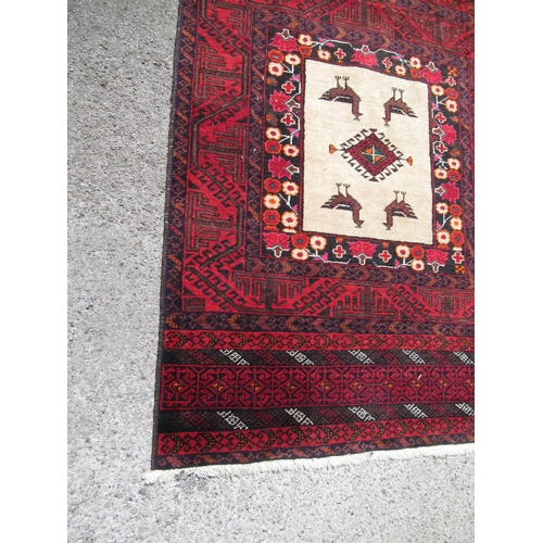 20B - Belouch rug with a medallion and bird design centre panel within multiple borders, 146 x 96cm