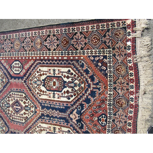 20C - Afshar rug with a five medallion design in shades of midnight blue, cream and red, 210 x 132cm