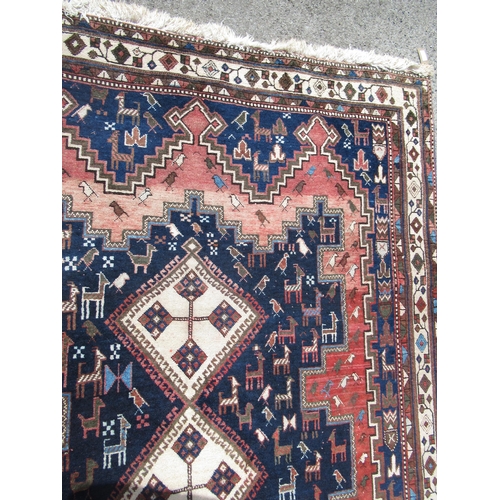 20D - Afshar rug with a triple hooked medallion design on a midnight blue ground with borders, 245 x 164cm