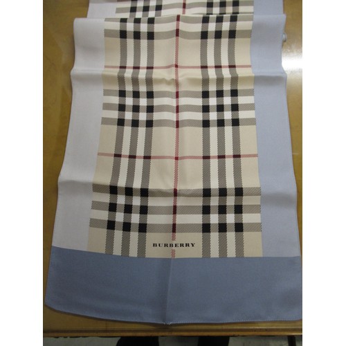 81 - Three various Burberry silk scarves