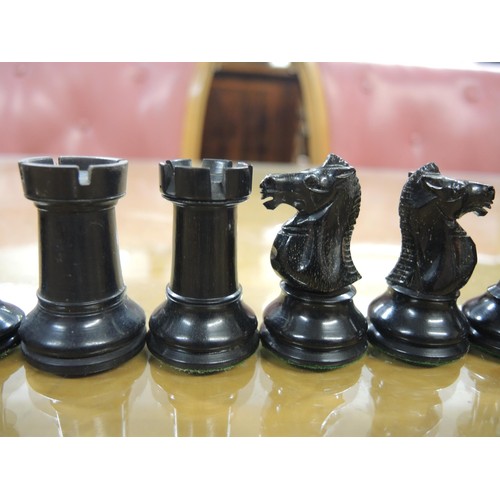 348 - Staunton pattern ebonised and boxwood chess set in later box, together with a large folding games bo... 