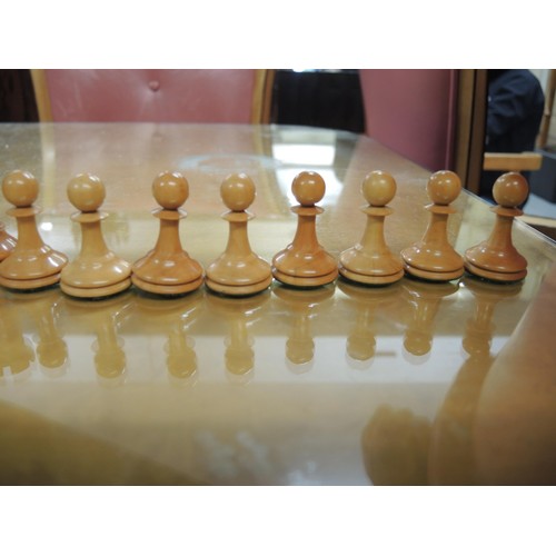 348 - Staunton pattern ebonised and boxwood chess set in later box, together with a large folding games bo... 